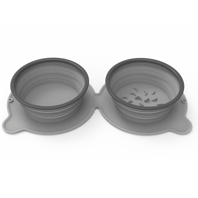 Gray double collapsible dog bowl, folded flat for travel, side view