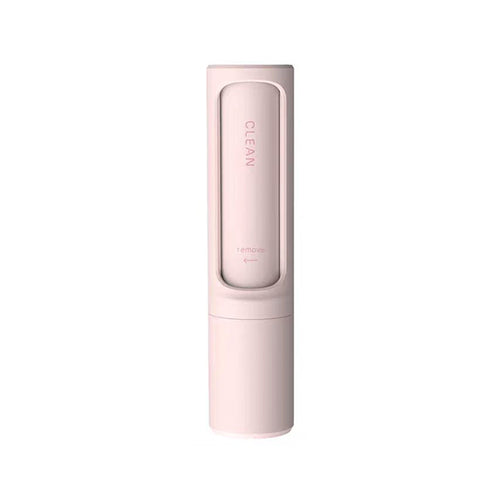 Pink 2-in-1 reusable lint brush for pet hair, front view on a white background