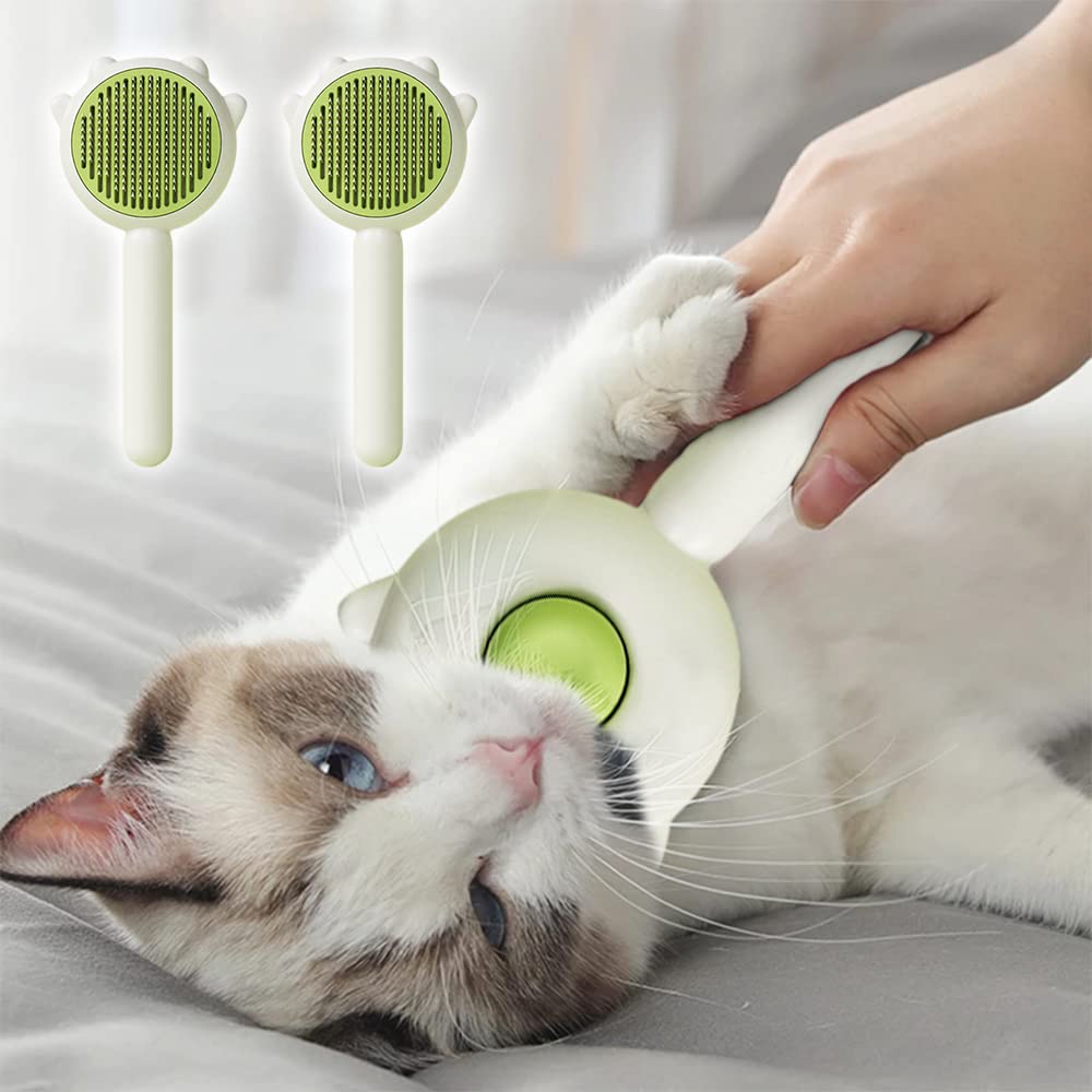 Cat relaxing while being groomed with a self-cleaning cat brush, plus two brushes in sage green