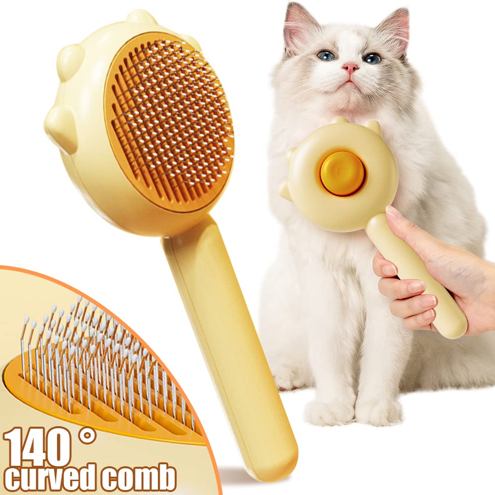 Yellow self-cleaning slicker brush for shedding shown beside a long-haired cat