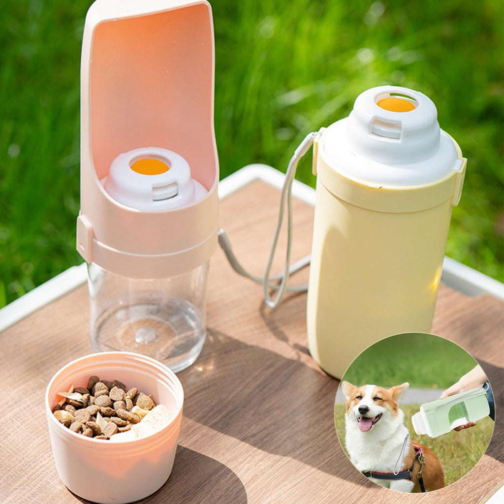 Travel dog water bottle with flip-out drinking tray beside a cup of dog food