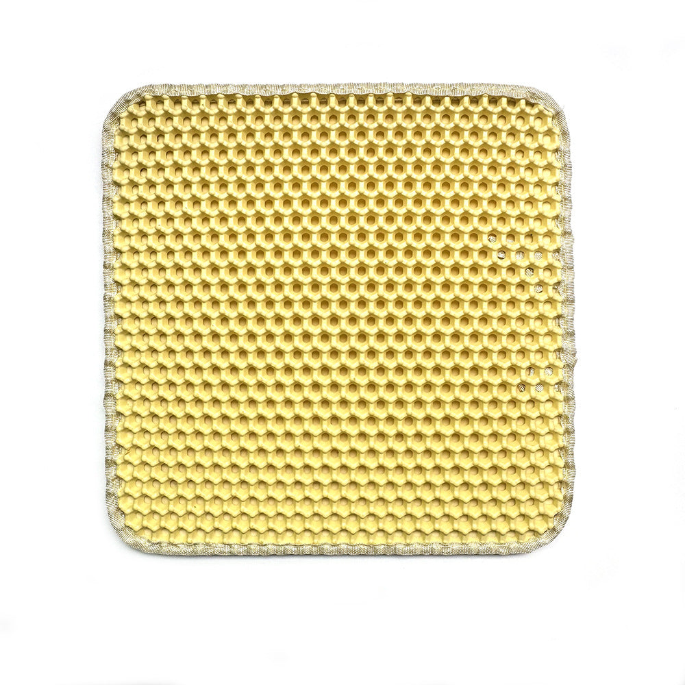 Close-up of the honeycomb top layer on an anti-splash cat litter mat